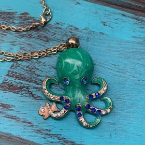Gold octopus necklace.